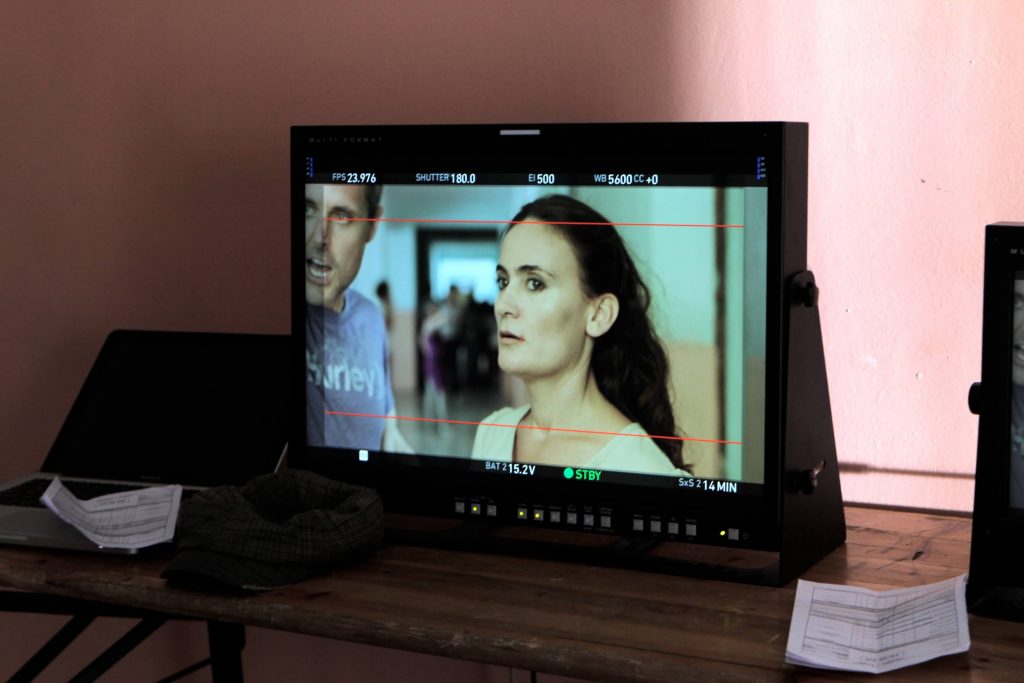 Still of Greta Zenelaj filming Eagle in Albania. monitor film